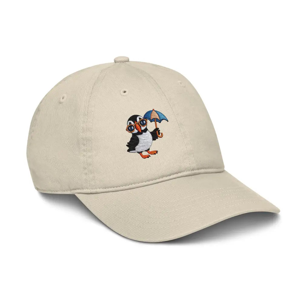 Embroidered playful puffin on organic dad hat by Trini Skies