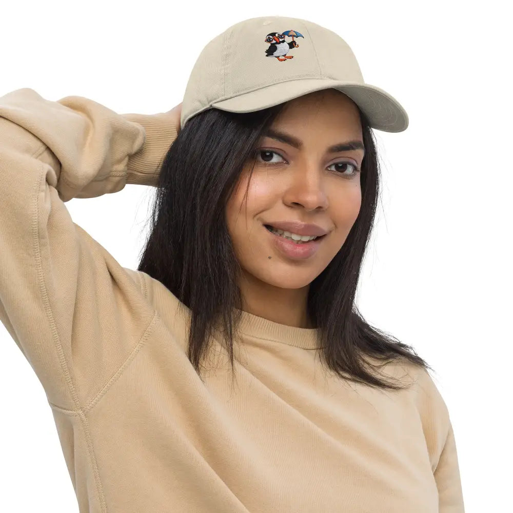 Embroidered playful puffin on organic dad hat by Trini Skies