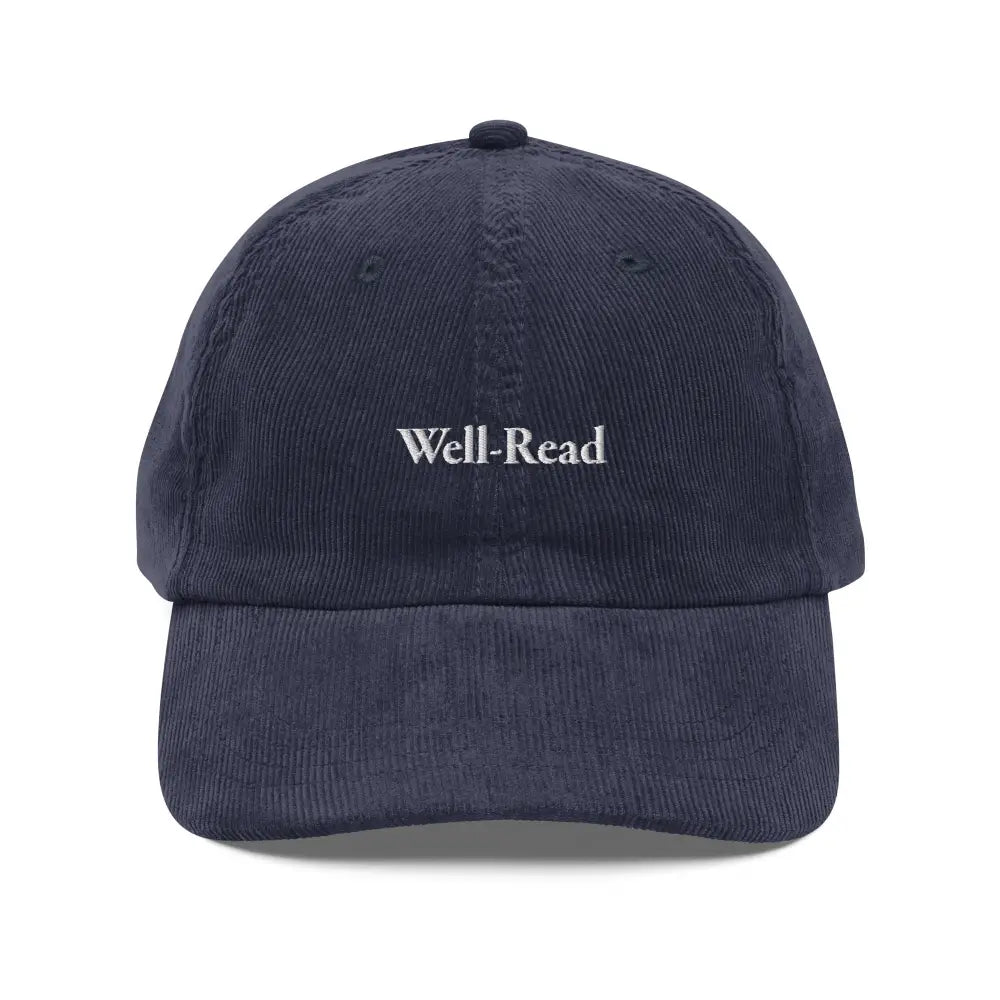 Dark blue embroidered corduroy cap with Well-Read front for book lovers