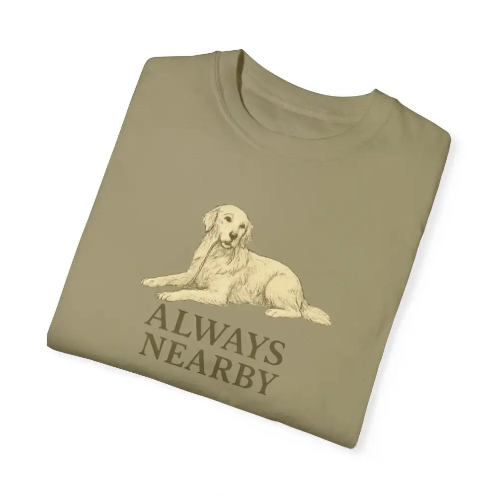 Folded olive green unisex garment-dyed t-shirt with Golden Retriever illustration