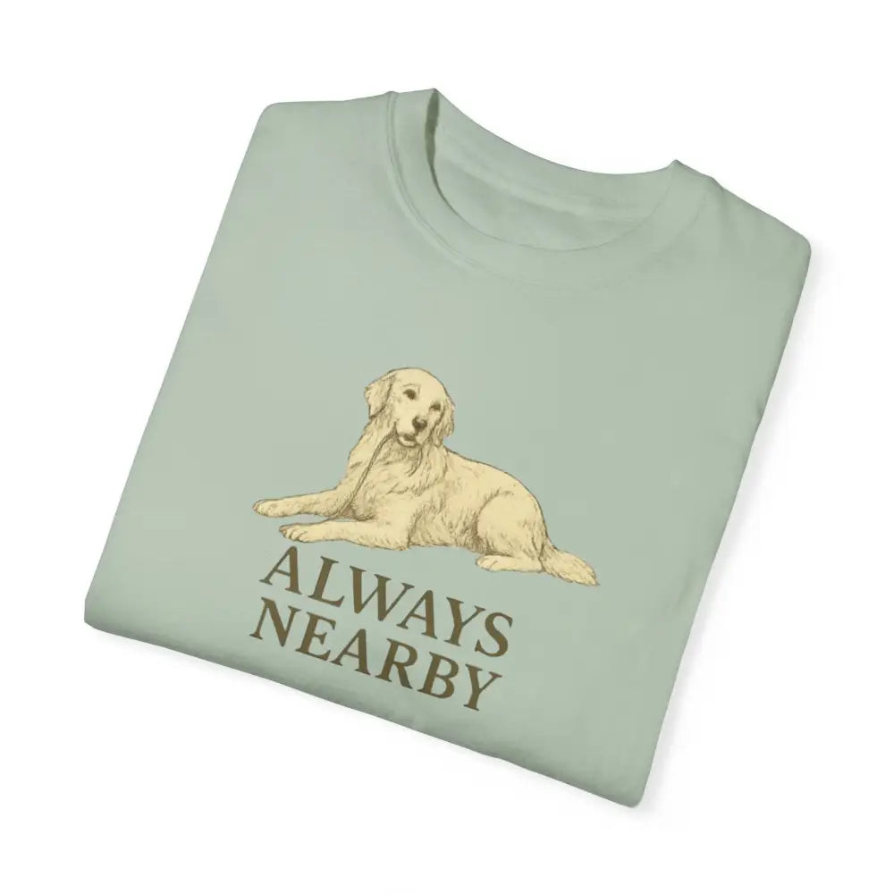 Light green unisex garment-dyed t-shirt with golden retriever and Always Nearby text