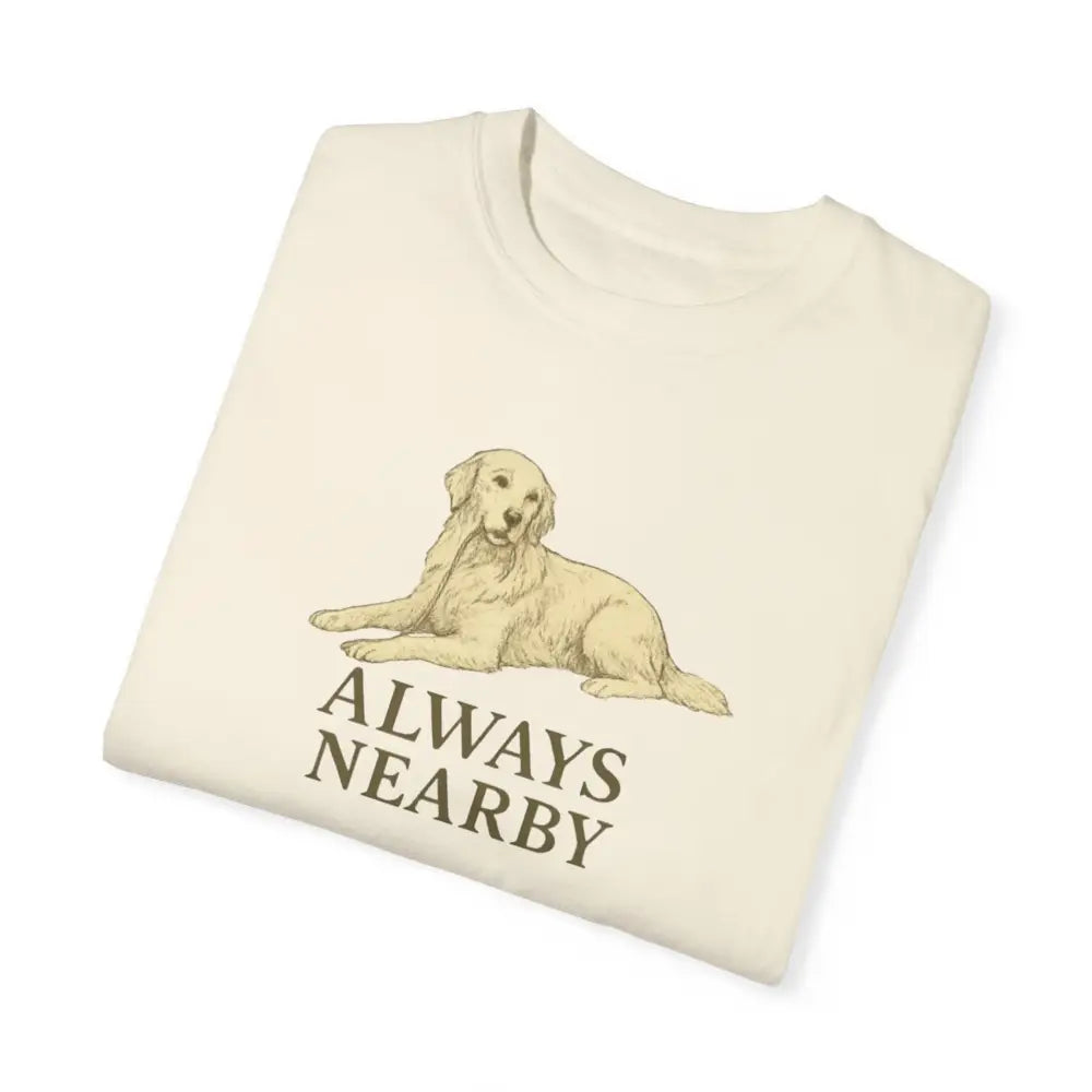 Folded cream unisex garment-dyed t-shirt with golden retriever print