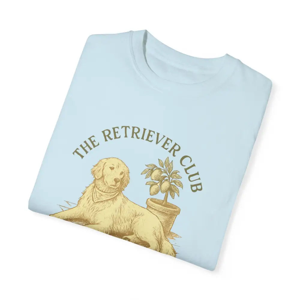 Light blue unisex garment-dyed t-shirt with golden retriever and potted plant graphic from Trini Skies Supply