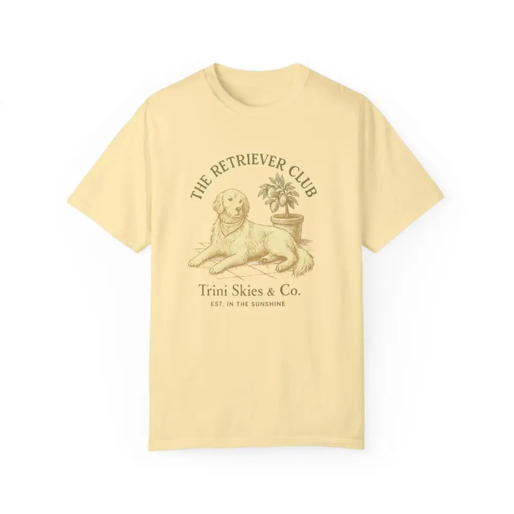 Light yellow unisex garment-dyed t-shirt with golden retriever and plant graphic from Trini Skies Supply