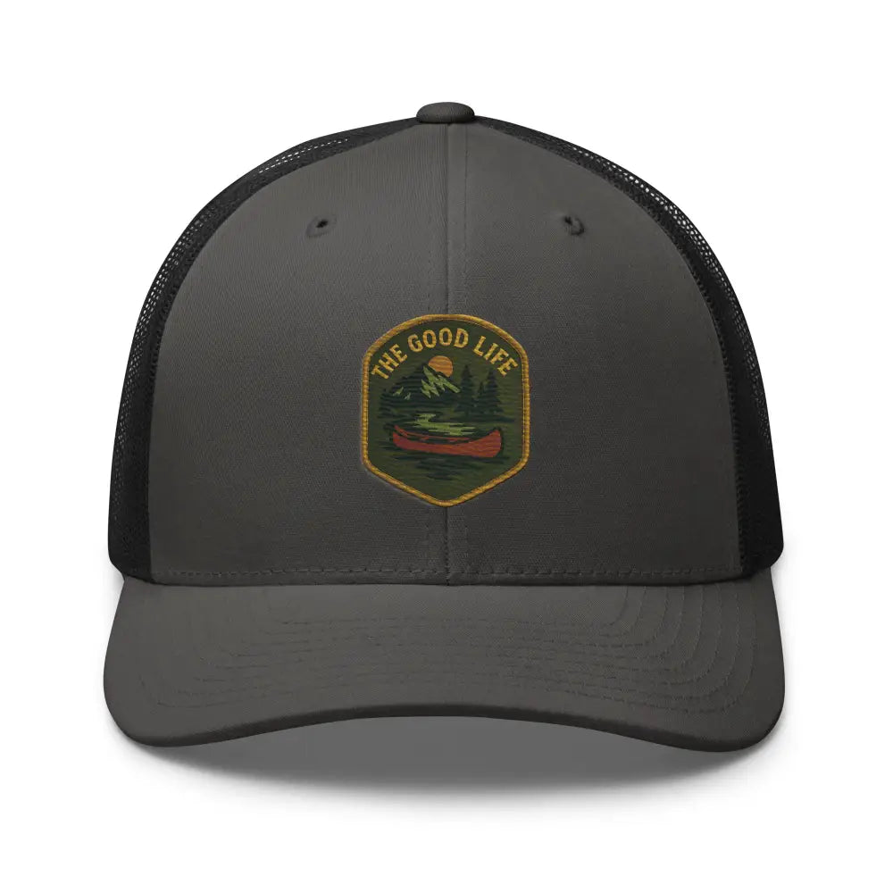 Dark gray embroidered trucker hat with nature-themed patch for make America great style