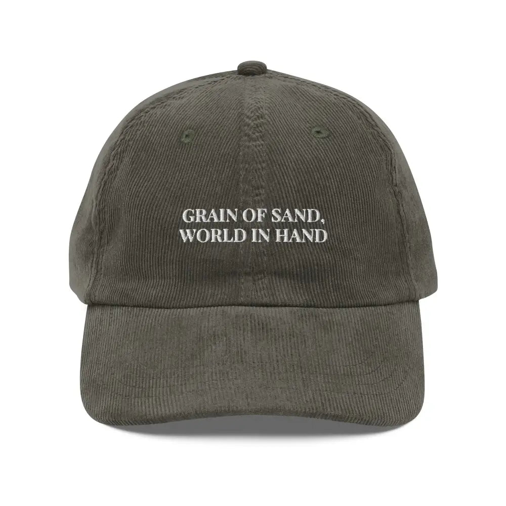 Olive green embroidered corduroy cap with Trini Skies text