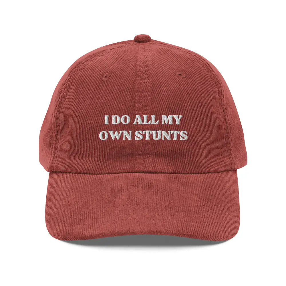 Solid terracotta vintage corduroy cap with I Do All My Own Stunts embroidery