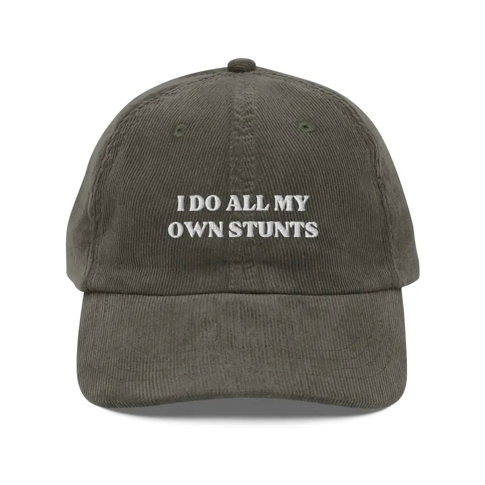 Olive green vintage corduroy cap with I do All my Own Stunts embroidered text