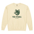 Cream-colored crewneck with stable heritage graphic of horse and horseshoe