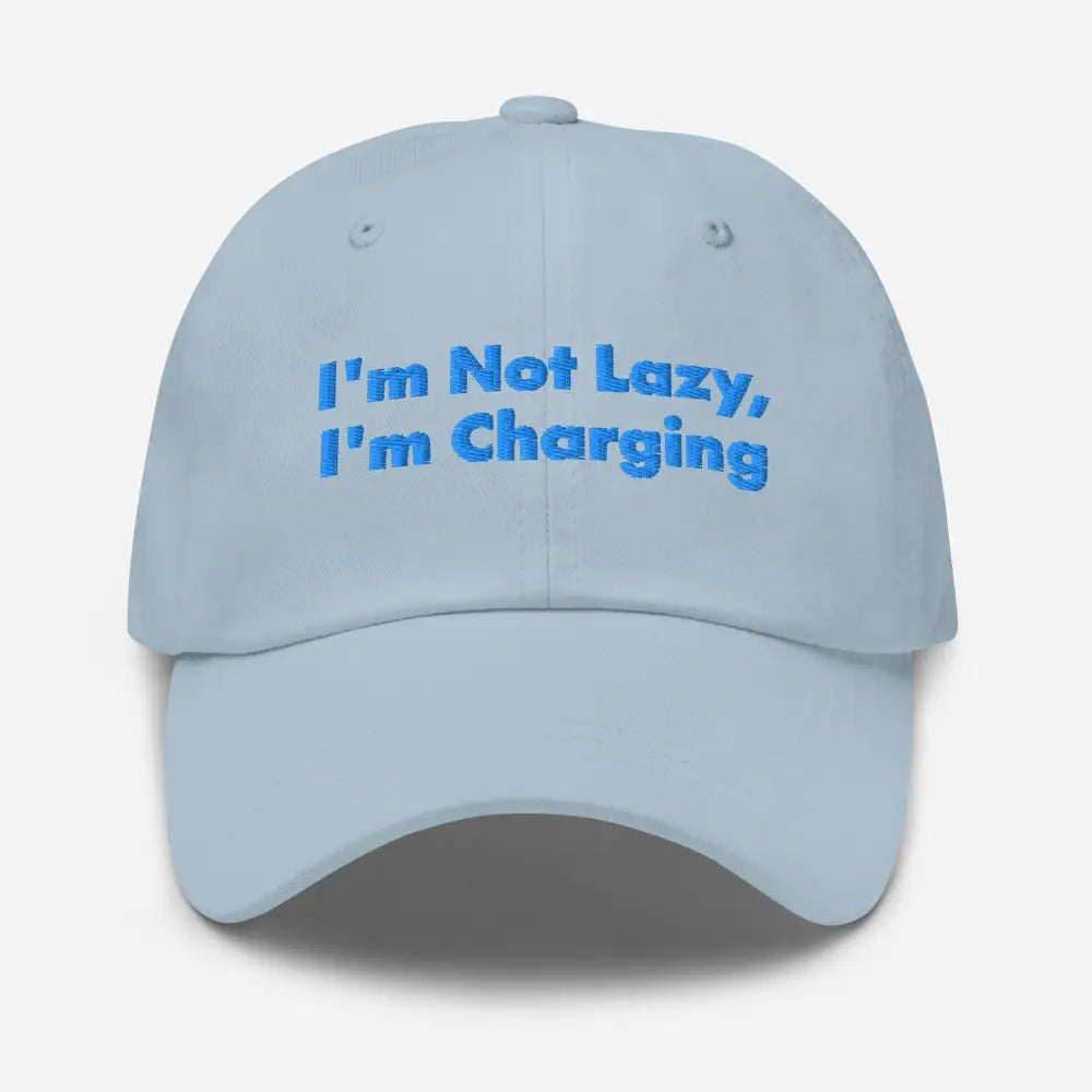 Light blue charging dad hat with Im Not Lazy Im Charging embroidery