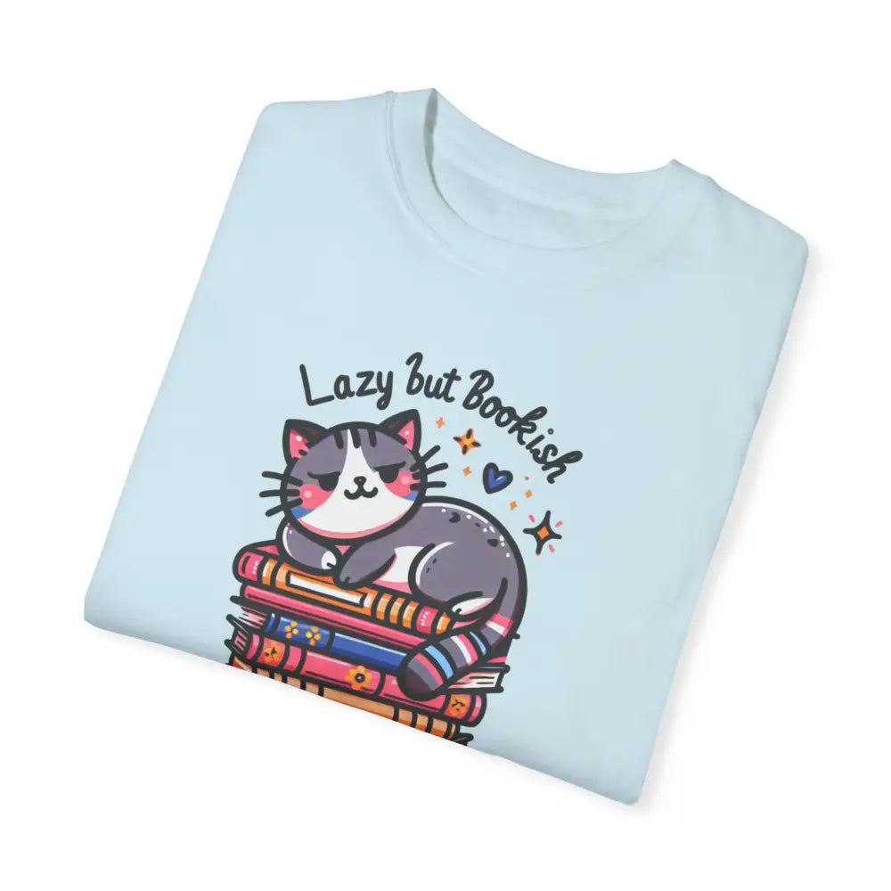 Light blue bookish adorable cat tee on stack of books