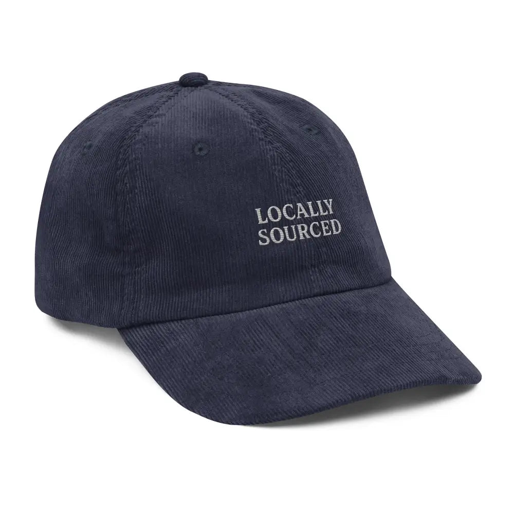 Navy blue embroidered corduroy hat with locally sourced embroidery