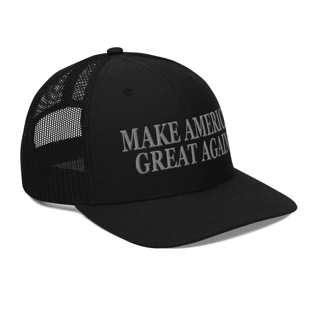 Black mesh-back trucker cap with embroidered MAGA text, perfect for patriotic pride
