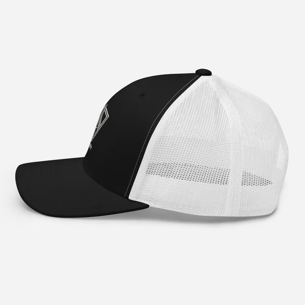 Black and white embroidered trucker cap with patriotic geometric mesh design