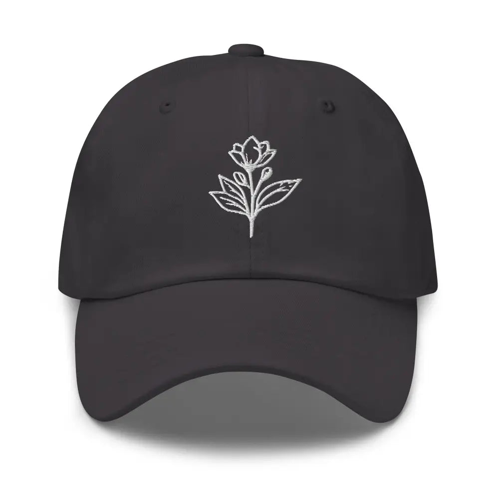 Minimalist embroidered floral hat with dark gray cap and white floral line art