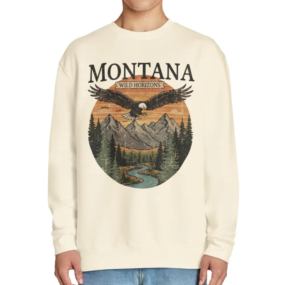 Cream-colored Montana sweatshirt with eagle mountain graphic and Wild Horizons text