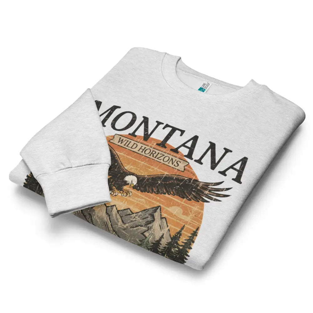 White Montana t-shirt with eagle mountain graphic and wild horizons sunburst