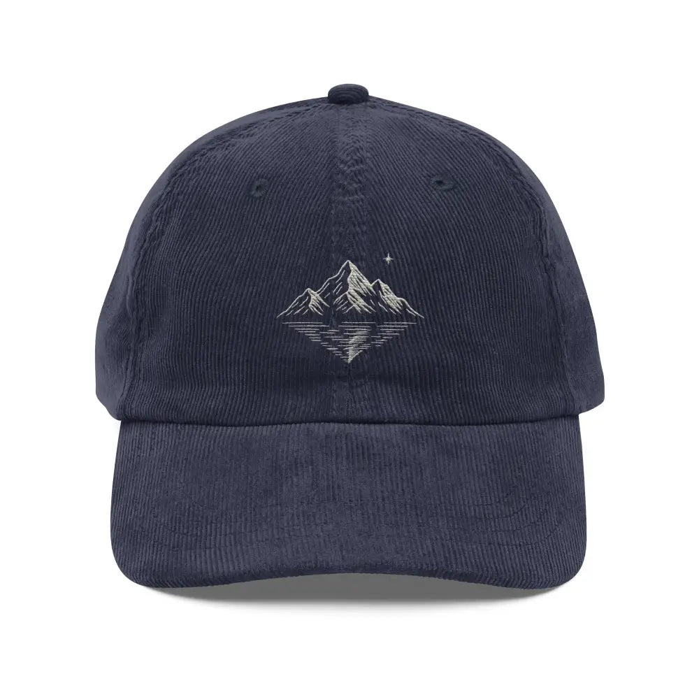 Dark blue embroidered corduroy hat with mountain reflection design