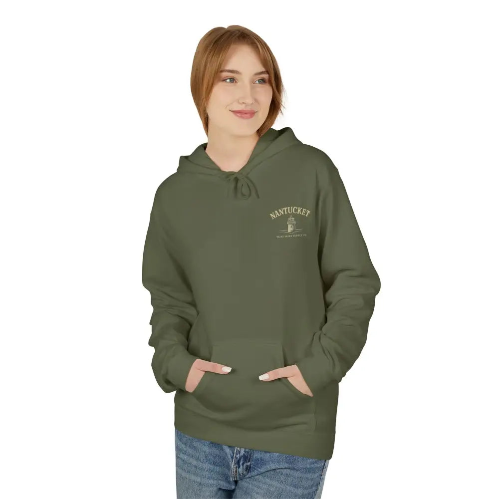 Woman wearing a Nantucket Lighthouse Coastal Graphic Hoodie with hands in front pocket