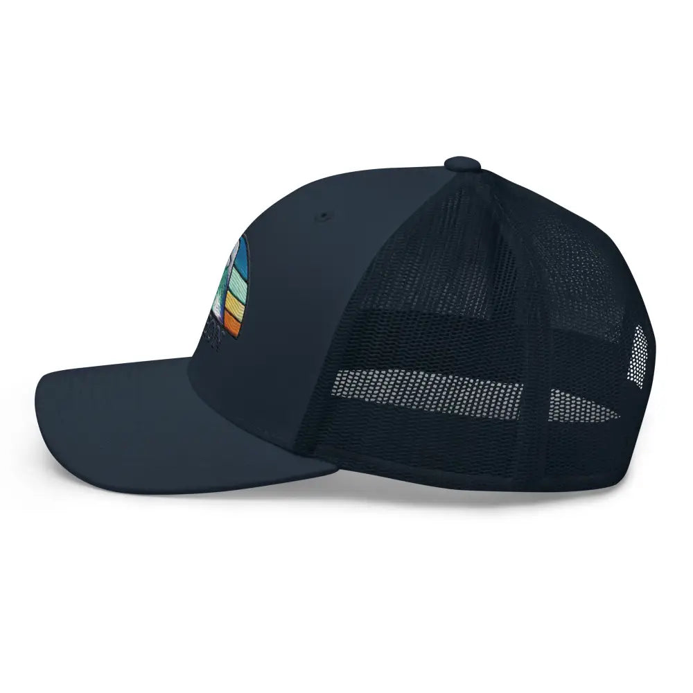 Navy blue embroidered pigeon trucker hat with mountain graphic