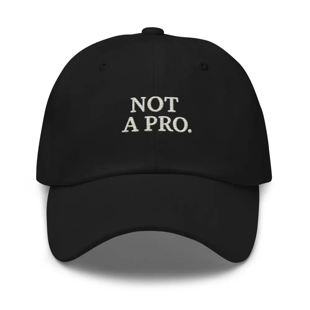 Black embroidered minimalist dad hat with Not a Pro text