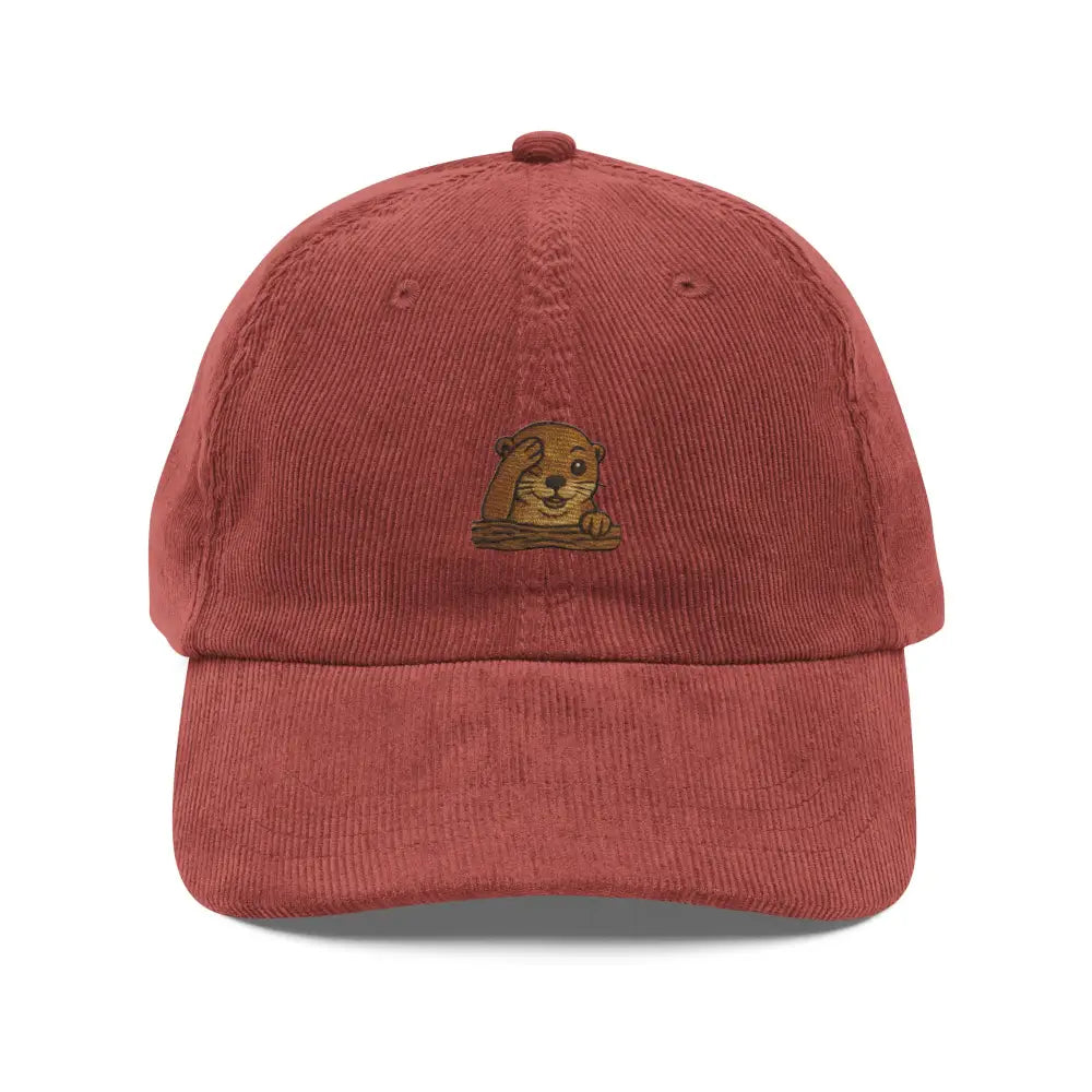 Charming otter peeking on reddish-brown embroidered corduroy cap