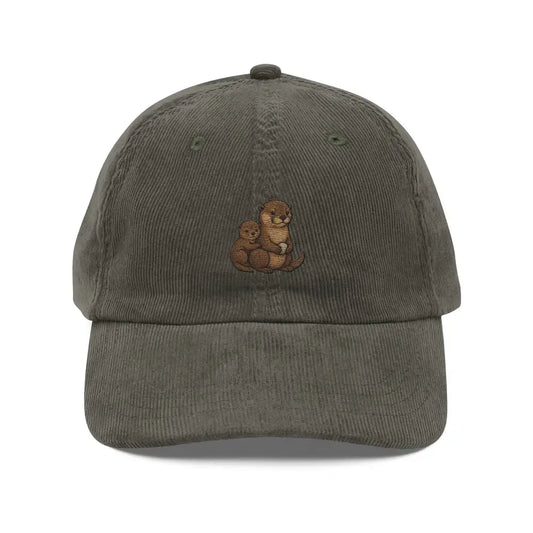 Olive green corduroy baseball cap with embroidered otters, featuring Trini Skies design