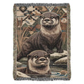 Otter woven blanket with two otters in reeds and water scene