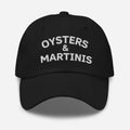 Embroidered dad hat with Oysters and Martinis in white on black cotton