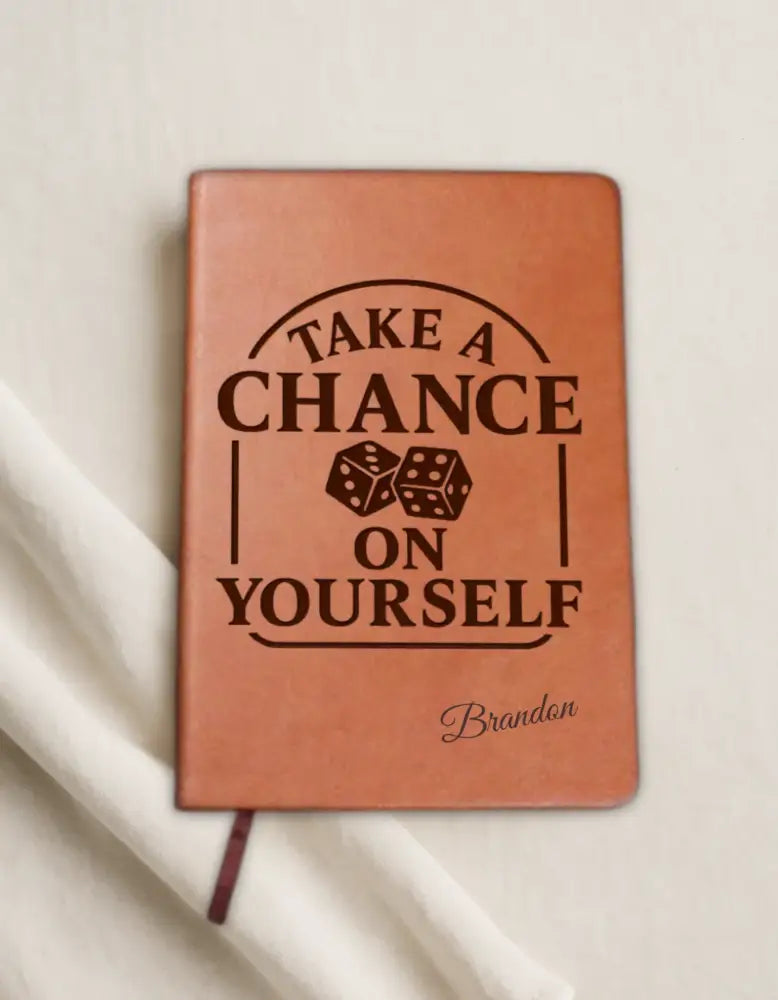 Brown leatherette self-belief notebook with Take a Chance on Yourself dice graphic