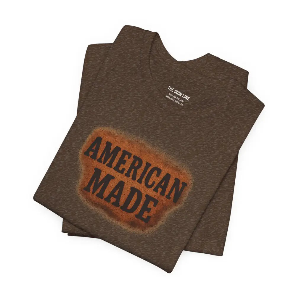 Brown heathered t-shirt with distressed orange graphic from Trini Skies Supply