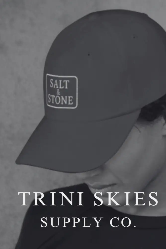 Trini Skies Supply Yupoong 6245CM unstructured embroidered dad cap in dark gray with white Salt & Stone patch