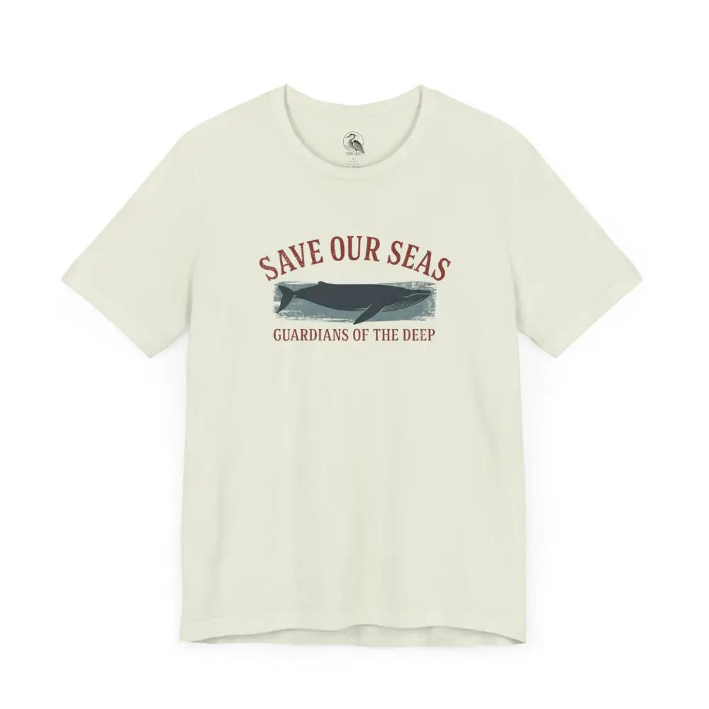 Trini Skies cream short-sleeve whale tee with Save Our Seas graphic