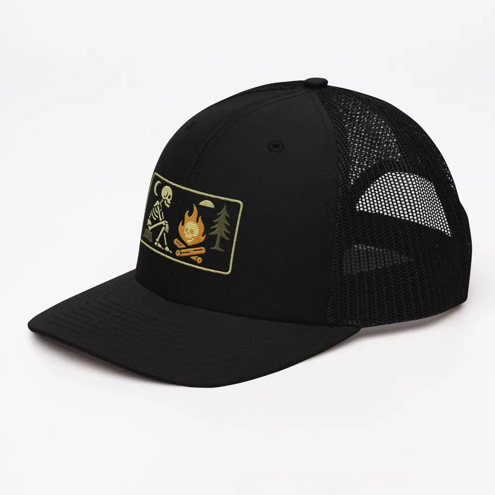 Black trucker hat with embroidered skeleton campfire rectangle patch and corduroy accents