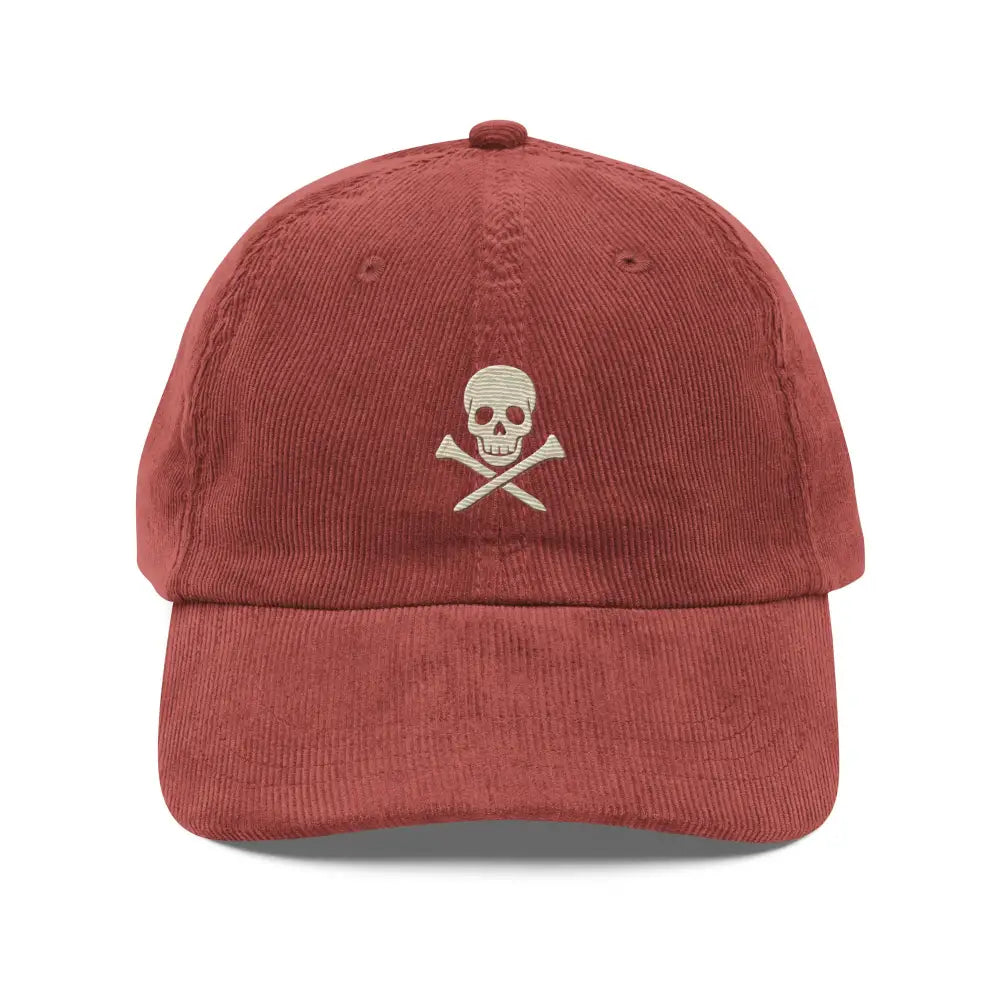 Embroidered corduroy Skull Golf dad hat in rust orange with skull and crossbones design