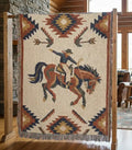 Beige southwest rodeo cowboy on horseback woven western heritage blanket