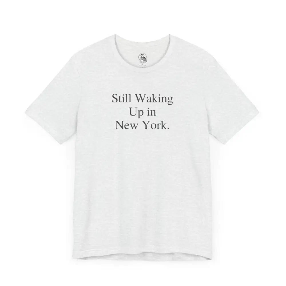 Minimalist Bella Canvas white NYC tee with Still Waking Up in New York print