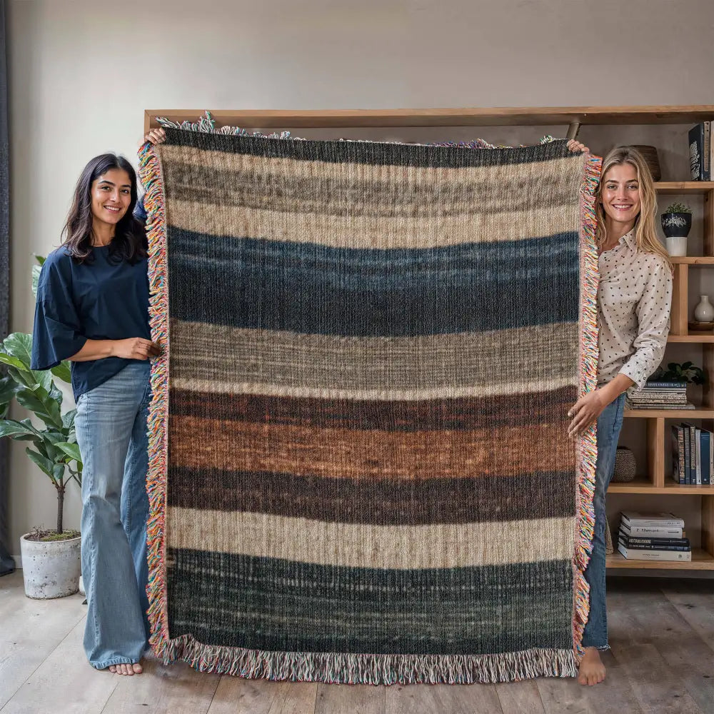 Striped woven blanket in neutral lodge-inspired cotton tapestry