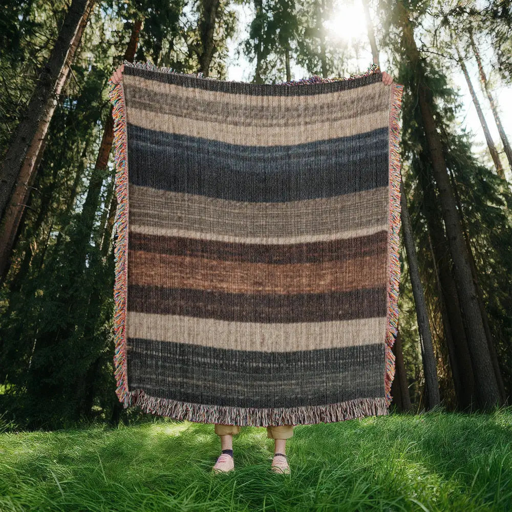 Striped woven blanket in neutral lodge-inspired cotton tapestry