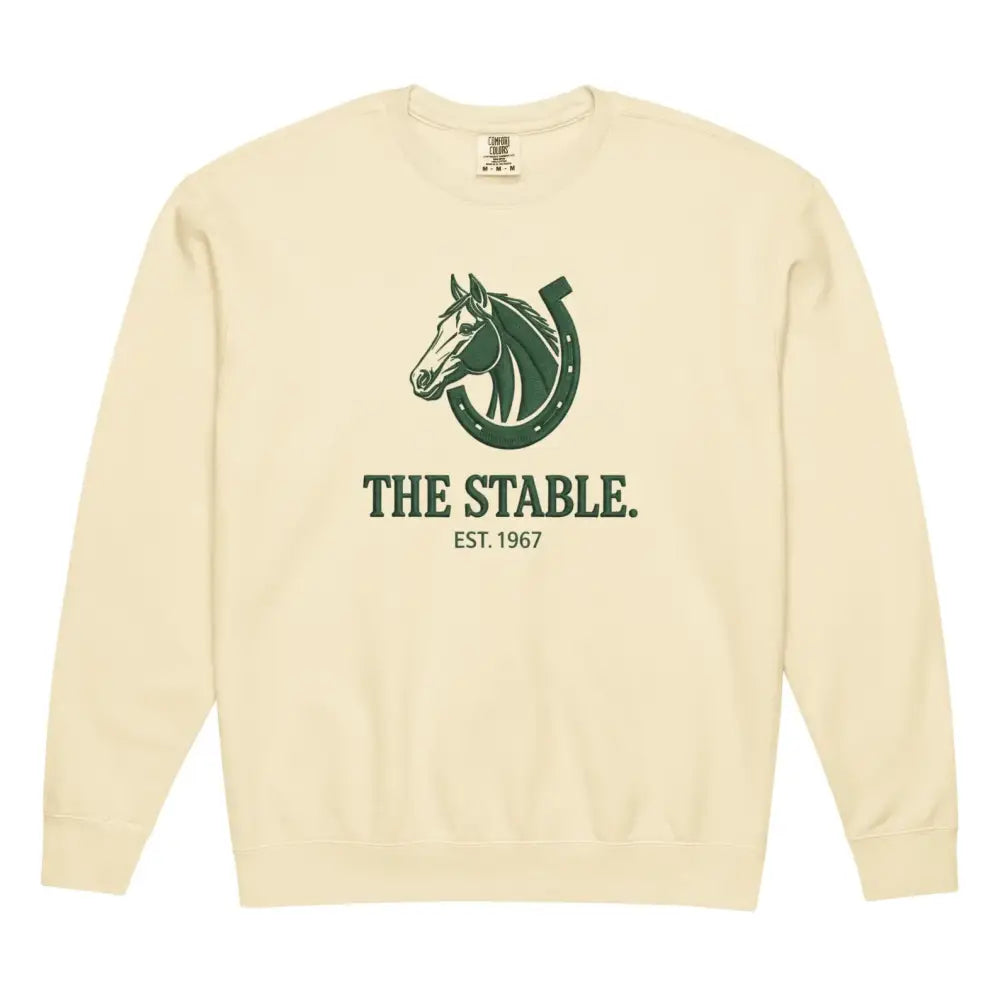Cream-colored crewneck with stable heritage graphic of horse and horseshoe