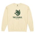 Cream-colored crewneck with stable heritage graphic of horse and horseshoe