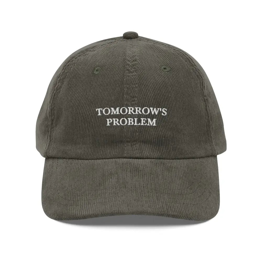 Dark green embroidered corduroy cap by Trini Skies with Tomorrows Problem text