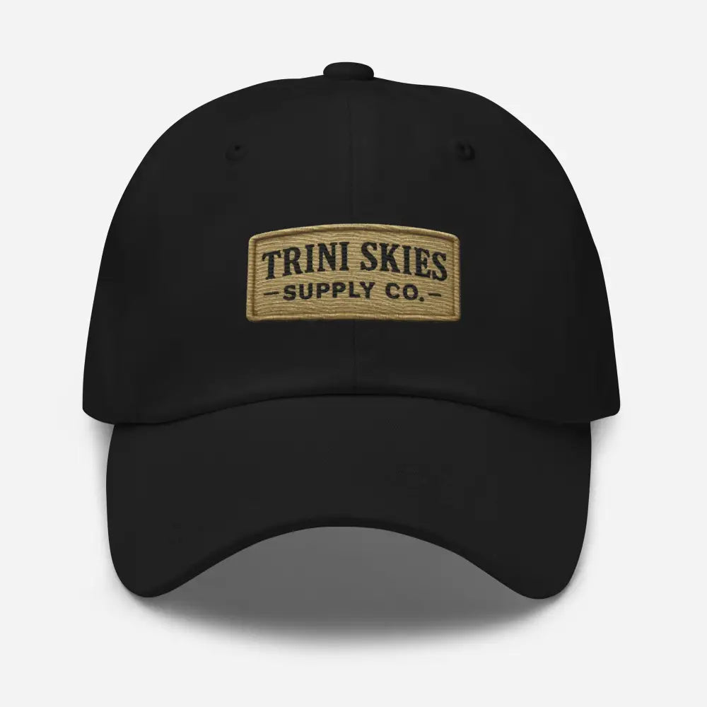 Trini Skies Heritage Patch Hat: black dad cap with tan embroidered patch