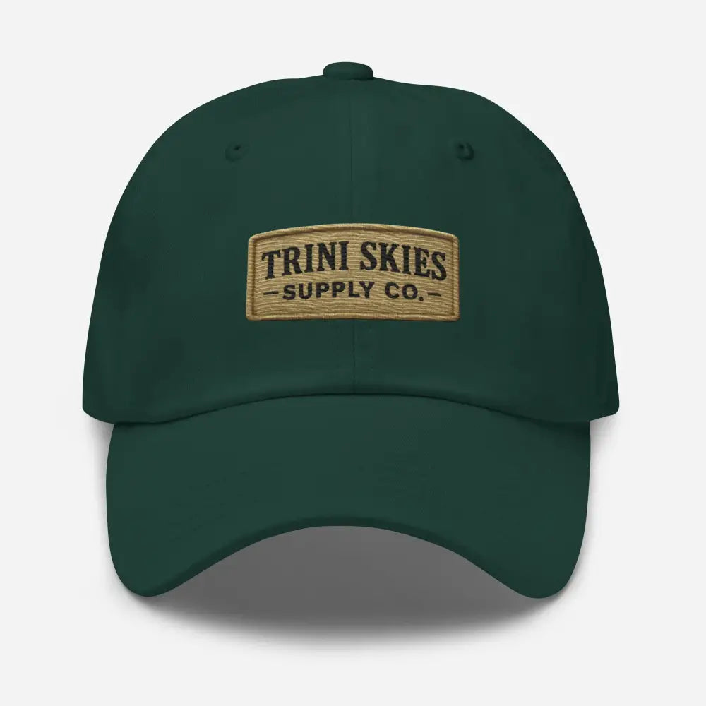 Dark green Trini Skies Heritage Patch Hat with embroidered patch