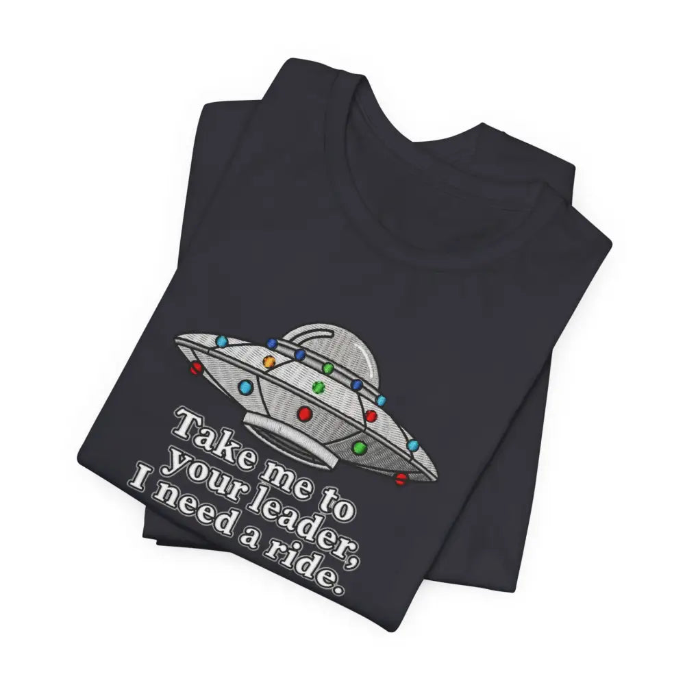 Folded dark gray UFO graphic tee with colorful alien spaceship design