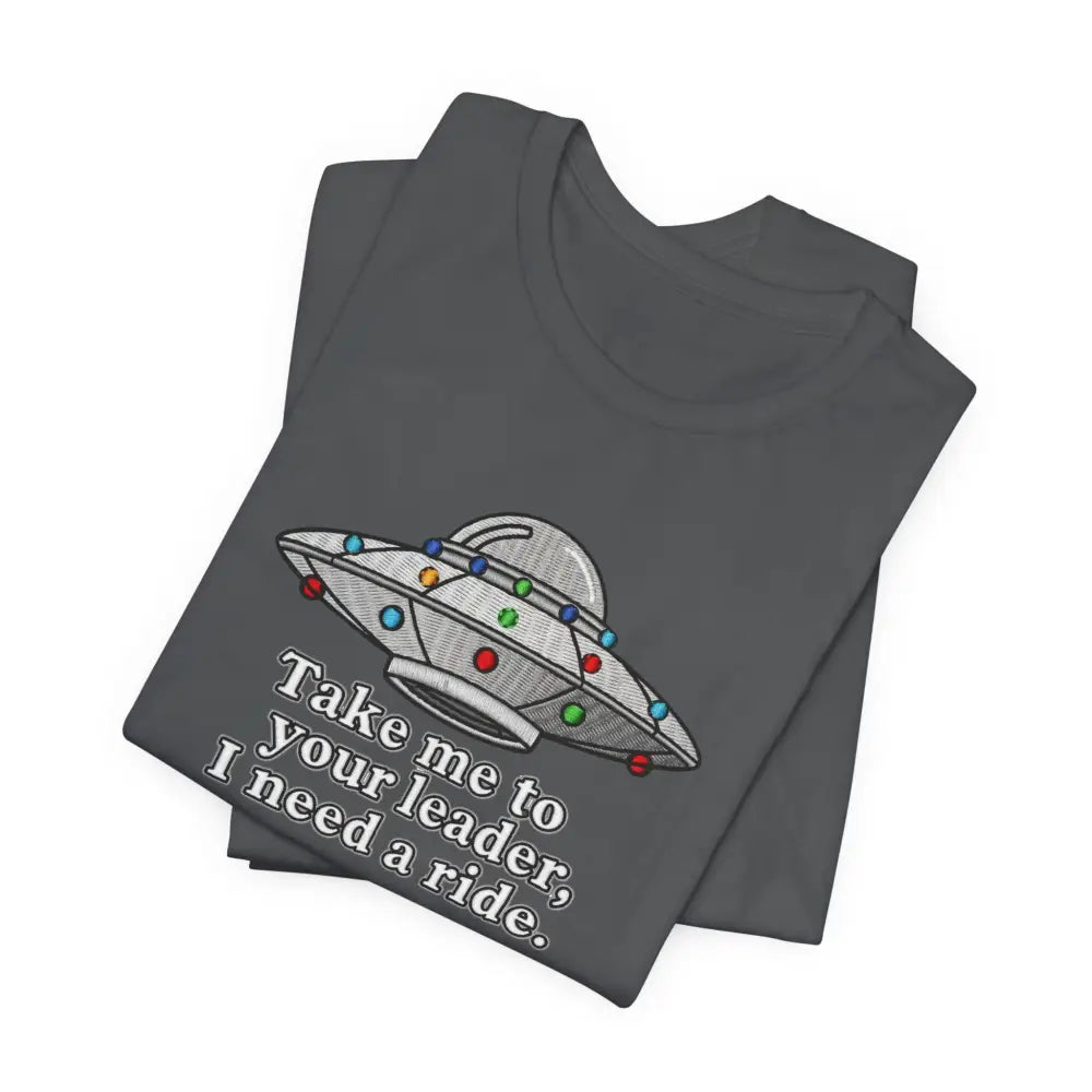 Folded dark grey UFO graphic tee with colorful embroidered UFO and white text