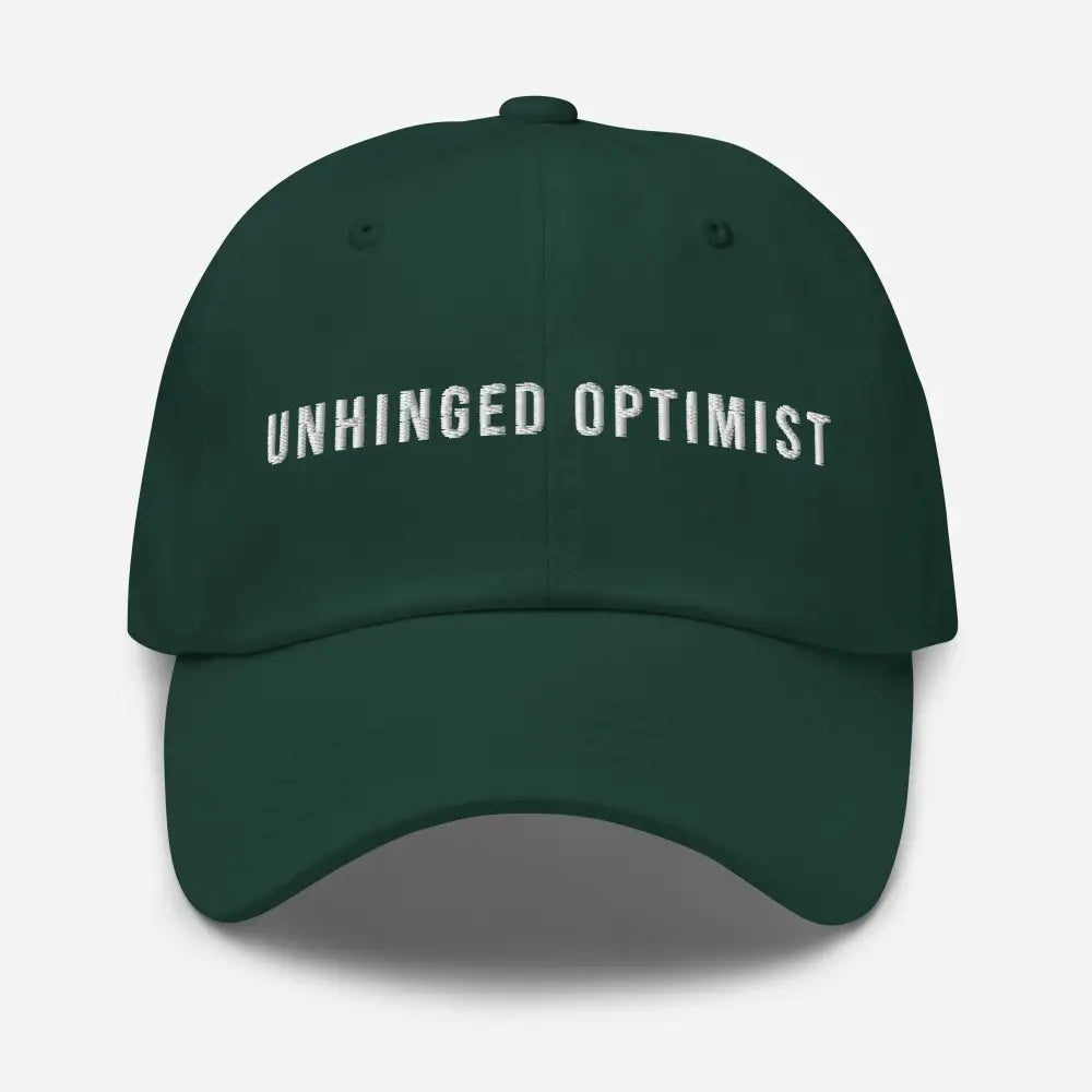 Unhinged Optimist Embroidered Dad Hat in dark green with white text