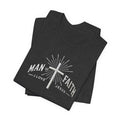 Folded black unisex jersey short sleeve tee with white cross and Man of Faith I Love Jesus design
