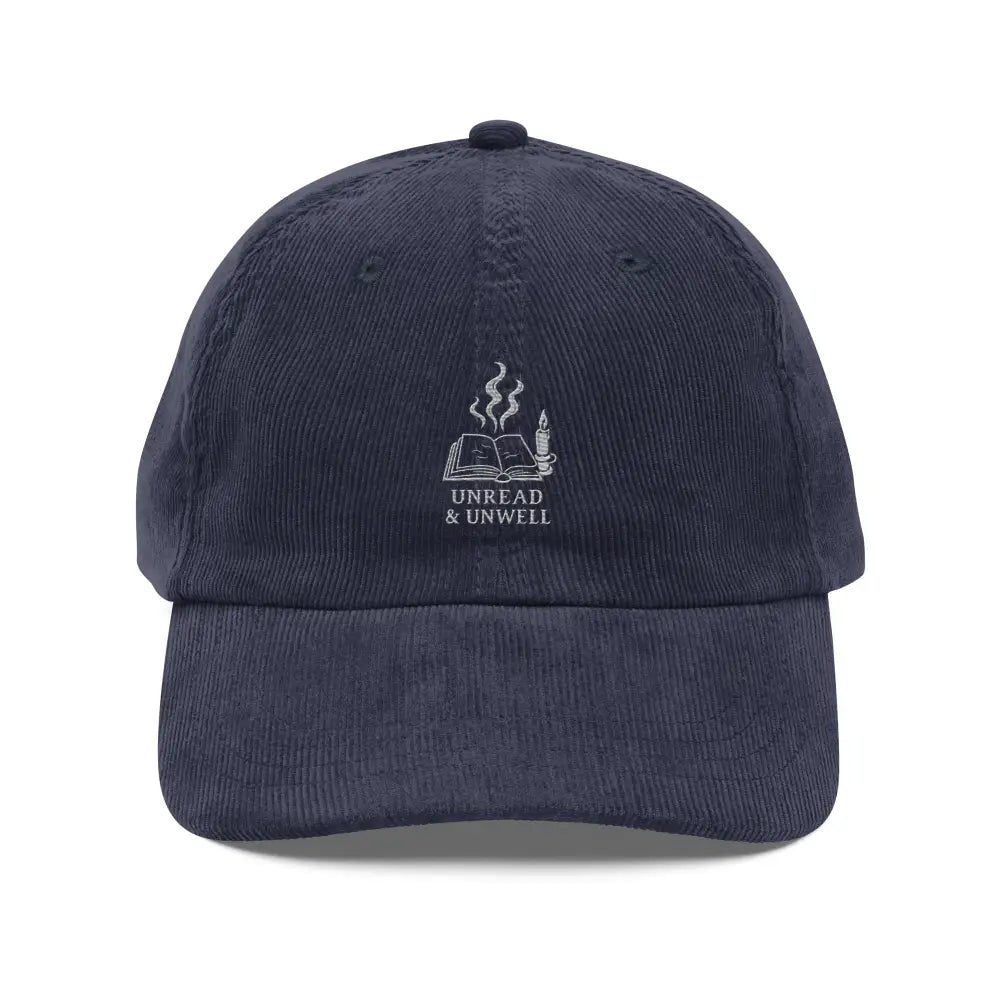 Dark blue embroidered corduroy hat with bookish goth academia book and candle design