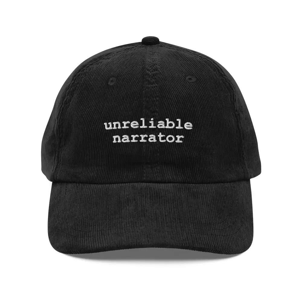 Black corduroy baseball cap with unreliable narrator embroidered design by Trini Skies